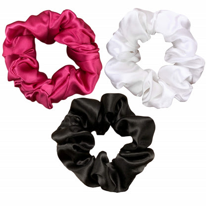 Black hot pink and white silk scrunchies by celestial silk with a white background