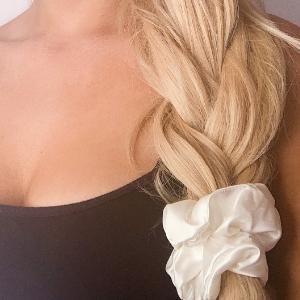 undyed silk scrunchy in braid in blond hair