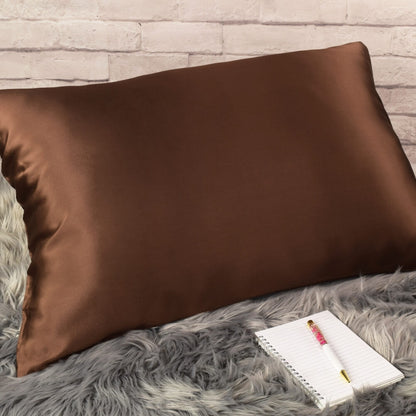 Celestial Silk 25 momme chocolate silk pillowcase on faux fur rug with notebook and pretty pen