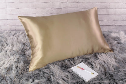 Celestial Silk 25 momme dark taupe silk pillowcase on faux fur rug with notebook and pretty pen