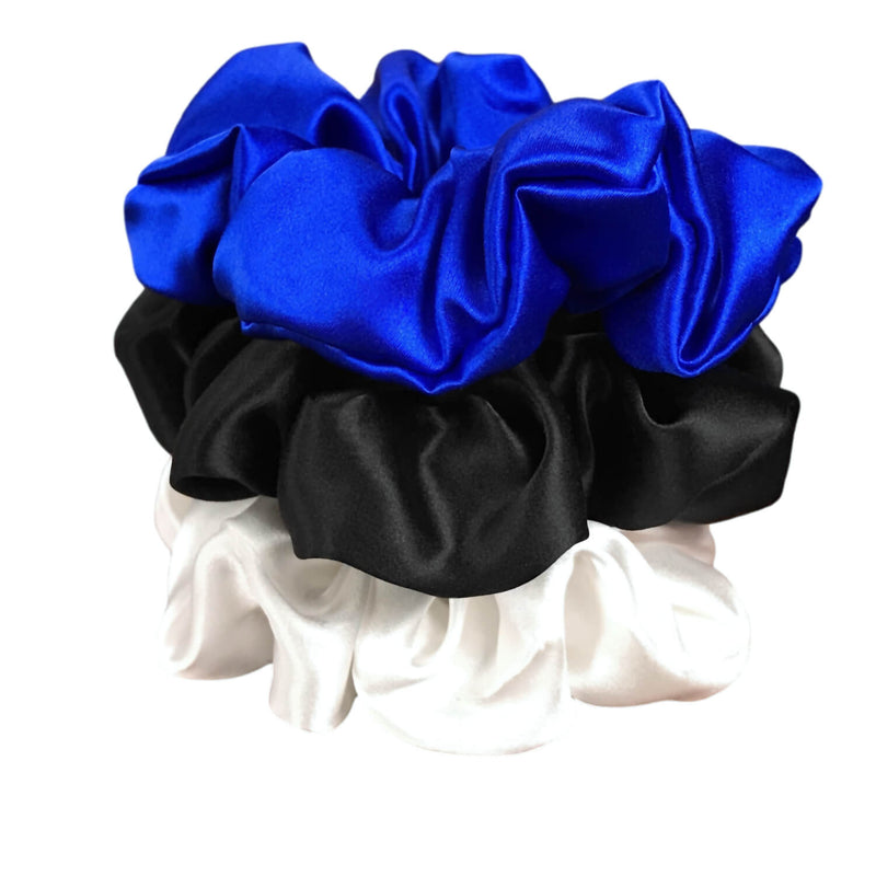Black blue and white silk scrunchies by celestial silk stacked with a white background