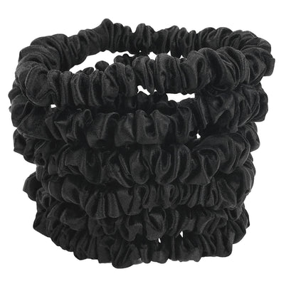 Mini Black silk scrunchies by celestial silk stacked with a white background