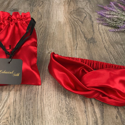 celestial silk twisted red silk headband for hair on counter with lavender and satin gift bag