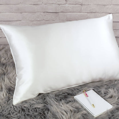 Celestial Silk 25 momme undyed ivory silk pillowcase on faux fur rug with notebook and pretty pen